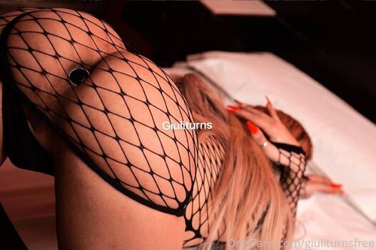 Giuli turns page 2 image