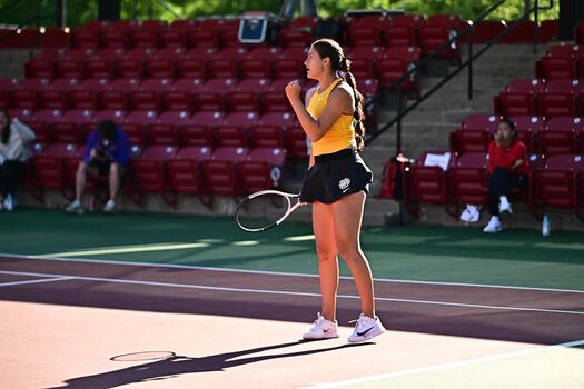 Woman college tennis image